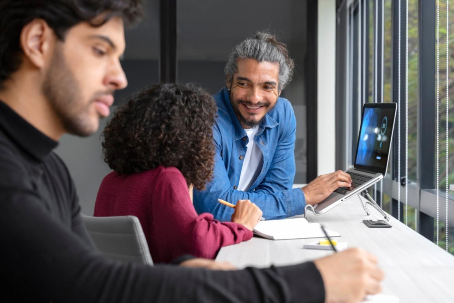 Professional business meeting discussing financial planning strategies