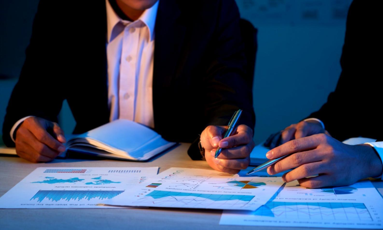 Financial analysis and forecasting workspace with charts and data